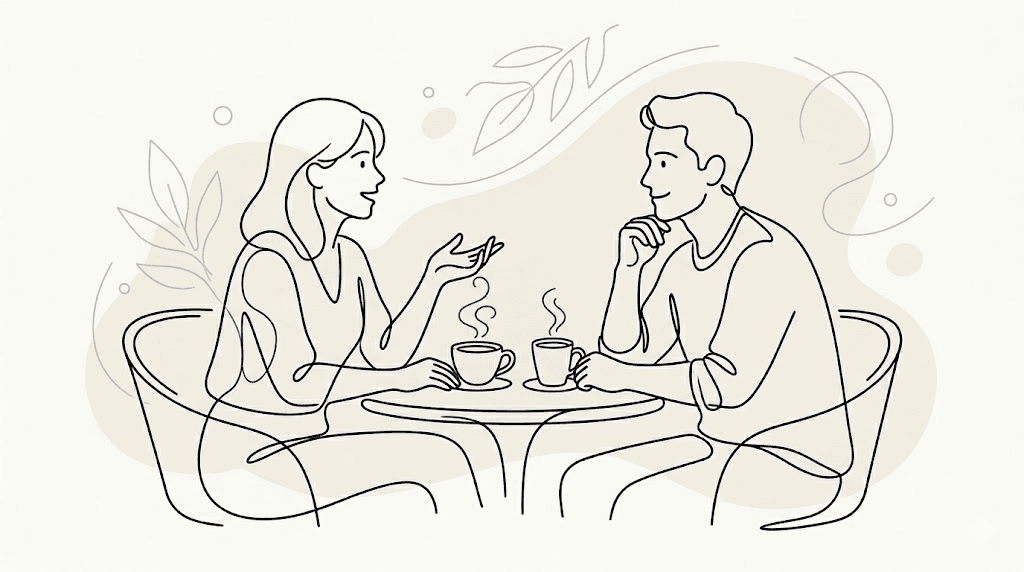 Two people having a mentoring conversation over coffee